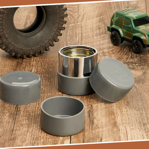 4 Pack Road Ready Rubber Trailer Bearing Dust Caps And Bearing Bras, 1.98 Inch Wheel Hub Covers For Boat Trailers, gray caps on wooden surface.