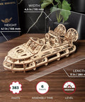 Rescue Hovercraft Wood Model Kit For Builders 1 24 Scale With Windup Motor And Intricate Twin Prop Design on desk, 11 in long