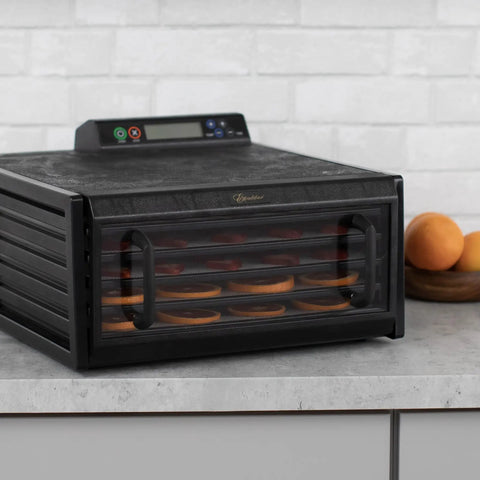 No Sweat Premium Electric Food Dehydrator With Clear Viewing Door And Five Stackable Trays features digital timer and trays of dried fruit.