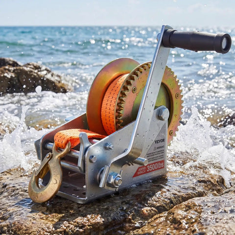 Beefy 3500 Lb Hand Boat Winch With 20 Ft Orange Strap, Two Way Ratchet, 2 Speed Switchable, Portable Manual Rope Crank, Anti Slip Handle For Boat Trailer And ATV Towing on rocky shore