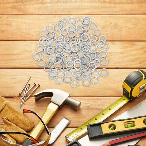 Beefy Stainless Steel Spring Lock Washers M8 Pack Of 100 304 for DIY Projects with tools on wooden background