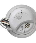 Hardwired Smoke And Carbon Monoxide Detector Featuring Zero Sweat Mounting And Heavy Duty Battery Backup For Smooth Home Security and interconnectable setup in white.