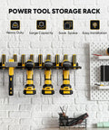 Power Tool Organizer Wall Mount Drill Holder Heavy Duty Garage Storage Rack with tools on white brick wall in workshop