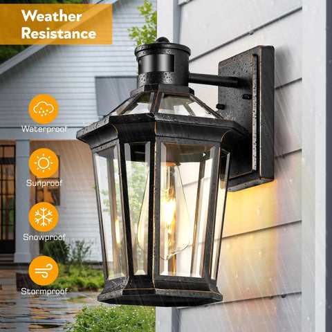 Motion Sensor Outdoor Wall Lantern In Black With Dusk To Dawn LED Exterior Sconce, Waterproof Aluminum, Hardwired on wall with rain visible