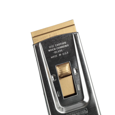 Heavy Duty 4 Inch Safety Scrapers Case Of 50 With Protective Blade Covers For Quick Paint And Adhesive Removal Durable Stainless Steel Pro Grade Scrapers Ideal For Walls Windows Glass And More SR500 close-up of stainless steel scraper with gold-colored blade cover.