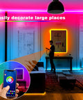 Room with vibrant 32.8 Ft Smart RGB LED Strip Lights For Bedroom With App Control And Remote, Music Sync Color Changing Tape.