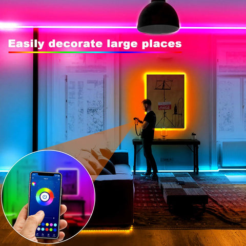 Room with vibrant 32.8 Ft Smart RGB LED Strip Lights For Bedroom With App Control And Remote, Music Sync Color Changing Tape.