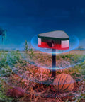 3x129 DB Crazy Loud Sound And Light Alarm with 360 Degree Ultrasonic Motion Sensor installed in a field, daytime view