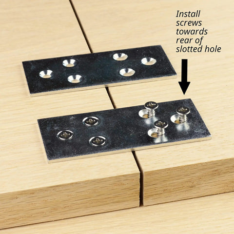 Heavy Duty Galvanized Mending Plates 3.5 By 1.5 Inches straight steel braces installed on wood panel with screws.