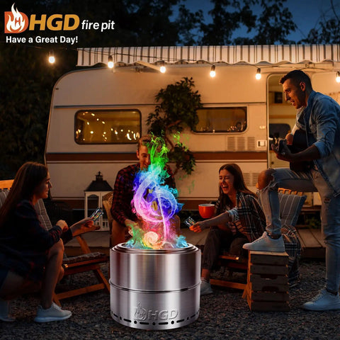 Lit Color Changing Campfire Packets Rainbow Flames For Fire Pit with friends around a fire pit by a camper trailer at night.