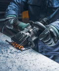 Worker using Five Eighths Inch Beveling Tool With Variable Speed And One Touch Depth Control on metal surface