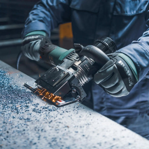 Worker using Five Eighths Inch Beveling Tool With Variable Speed And One Touch Depth Control on metal surface