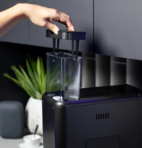 Game Changer Automatic Espresso Machine Packing Built In Milk Frother showing removable water container in glossy black finish.