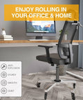 Office chair with Heavy Duty Gas Lift Cylinder Replacement For Office Chairs Universal 50mm 2 Inch Fit Class 4, against desk.