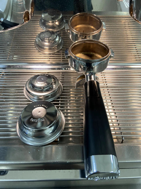 Top Shelf 58mm Pressurized Filter Basket Stainless Steel Double Wall Espresso Portafilter replacement cup displayed with portafilter.