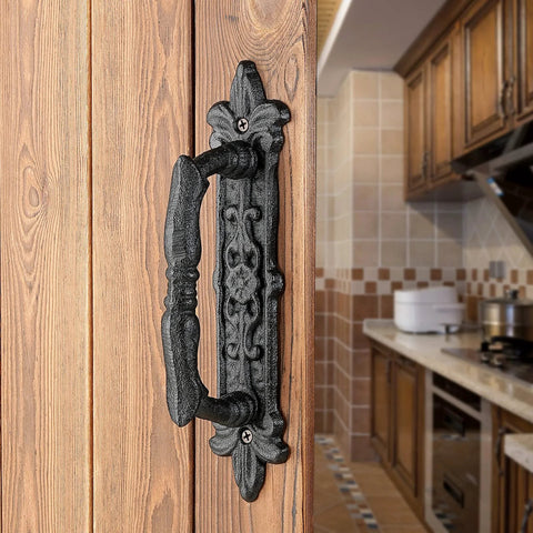 4 Pack Heavy Duty 8.9 Inch Black Cast Iron Barn Door Handles Set mounted on wooden door in rustic kitchen setting