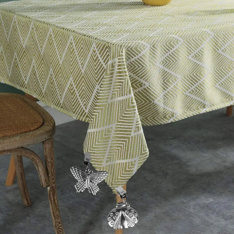 Eight Pack Tablecloth Weights With Metal Clip Clamps secure cloth on outdoor table with patterned cover, windproof and rust-resistant.