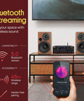 Home Karaoke Amp Receiver With Bluetooth Streaming And Two Hundred Watt Peak Power Dual Mic Inputs on a shelf