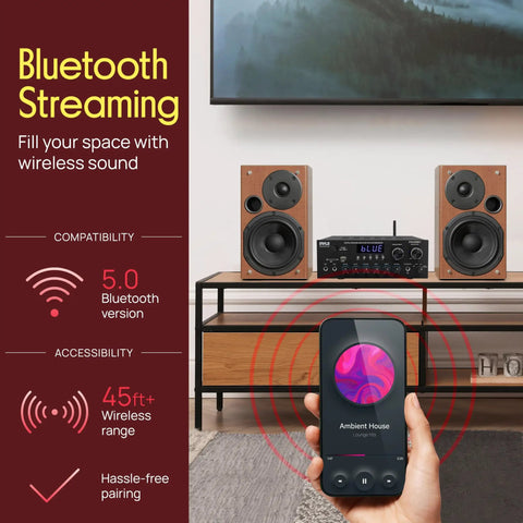 Home Karaoke Amp Receiver With Bluetooth Streaming And Two Hundred Watt Peak Power Dual Mic Inputs on a shelf