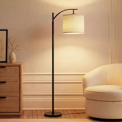 Arc Shaped LED Floor Lamp With Hanging Shade for living rooms and offices, sleek modern lighting, black, marble base in a cozy room.
