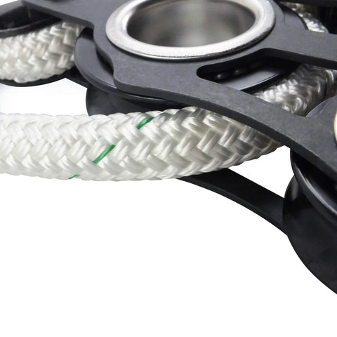 Close-up of Deluxe Fiddle Block Kit with Anodized Aluminum UniBody Frame for tree pulling showing rope and sheaves detail.
