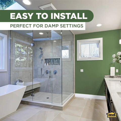 Bathroom with 4 Inch Wide Dry Back Vinyl Wall Base Roll With Flexible Toe Kick No Fuss Easy Install Molding and glass shower