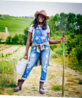 Gardener holding Heavy Duty Huge Digging Fork For Gardening And Lawn Cleanup Sturdy Metal Pitchfork, standing in farm field