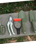 D Shaped Shovel Handle Replacement Grip for household shovels on a wooden bench with garden tools