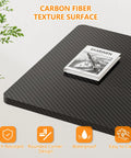 Close-up of carbon fiber texture surface on 32 Inch Portable Standing Desk On Wheels, with magazine and pen on top.