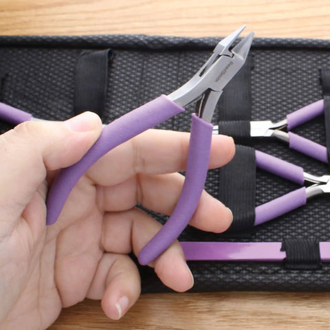 Hand holding pliers from 8 Piece Beading Pliers Set with Color Coordinated Tools and Orchid Leather Case for Jewelry Making