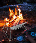 Folding Campfire Grill For Camping And Backpacking Portable Charcoal Fire Pit With 304 Stainless Steel Construction in use outdoors