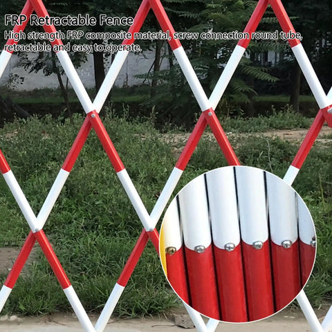 Hardened Steel Expanding Safety Barricade Hella Visible Traffic Barrier With Slick Rolling Casters Top Shelf Folding Pedestrian Gate For Driveways And Worksites Solid Red White Color Block Design detailed view of red and white retractable fence structure with grass background.
