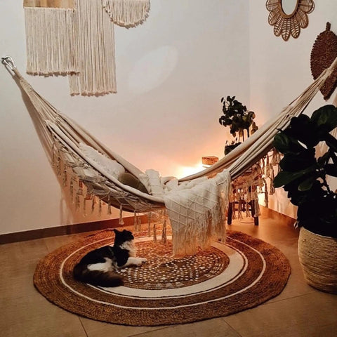 Heavy Duty Double Hammock With 500 Lb Load Capacity, Tassel Trim, Fishtail Knit Design, beige fabric, indoor setting with cat