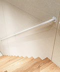 Heavy Duty White Metal Railing Kit 20Ft Deck Guardrail Stair Bracket in white, mounted on wall next to wooden stairs.