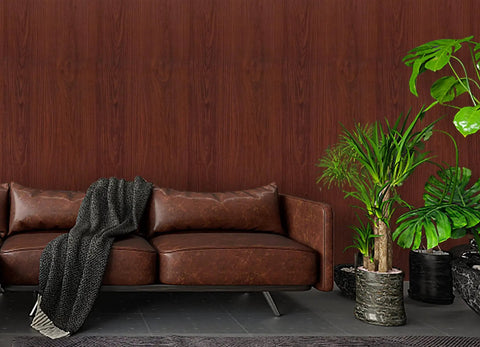 Living room with Red Brown Wood Grain Peel And Stick Wallpaper With Waterproof Self Adhesive Backing Thick Texture behind leather sofa