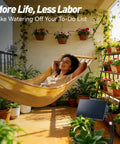 Woman relaxing on a balcony hammock with solar powered drip irrigation kit watering plants, showcasing easy setup for balconies.