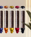 Wall Mounted Coffee Bean Dispenser Game Changer Hella Spacious Airtight Storage Jar With Clear View Real Deal Heavy Duty Aluminum Seal Fresh Bean Stash Perfect For Cafe Or Home Kitchen Orange Two Pack showing multiple colors and filled with coffee beans.