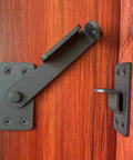Heavy Duty 90 Degree Gate Latch With Padlock Hole for barn doors fences cabinets and windows, installed on wood surface