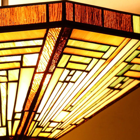 Close-up of Tiffany Style Stained Glass Ceiling Lamp 2 Light 14 Inch Wide Amber Brown Semi Flush Mount with warm glow.