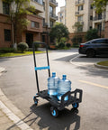 Industrial Grade Aluminum Alloy Hand Truck Featuring 500 Pound Heavy Duty Capacity For Tough As Nails Performance And Smooth Rolling Platform Dolly Cart With Extra Wide Base And Durable Construction carrying two water jugs in a residential area.