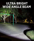 Dual Pack Tactical LED Flashlight S1000 T6 Upgraded Ultra Bright Zoomable Beam lighting up a park at night.