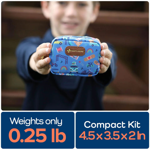 KeepGoing Kids small travel first aid kit, blue fabric with vehicle print, front view; compact 4.5x3.5x2 in.
