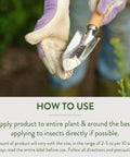 Gardener holding trowel with Crawling Insect Killer With Diatomaceous Earth For Organic Home Garden Use, background plants