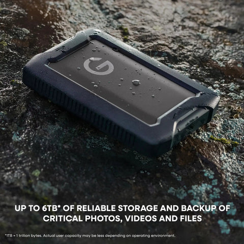G Drive ArmorATD 5TB Rugged Portable External Hard Drive USB C 5Gbps USB 3.2 Gen 1 on wet rocky surface
