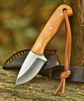 Five Point Five Inch Handmade Hunting Skinning Knife With Two Inch D2 Steel Fixed Blade And Three Point Five Inch Olive Wood Handle Premium Leather Sheath With Lanyard Hole EDC Bushcraft Camping And Survival Tasks resting on a log.