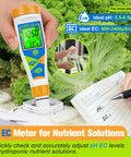 4 In 1 pH EC TDS Temperature Water Tester with large display measuring pH and EC levels in hydroponic setup with lettuce.