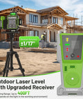 4D Self Leveling Green Laser Level With Receiver For Construction And Framing 360 Degree Cross Lines 400 Ft Range Job Site Tough Dead On Target Pro Rig For Tiling And Flooring on tripod near a building site.