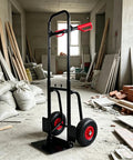 Beast Mode Heavy Duty Foldable Platform Trolley With Double Handles And 10 Inch Rubber Wheels, 330 Lb Load Capacity, Collapsible Moving Cart For Warehouse, Garden, Grocery, Indoor And Outdoor Use, black steel frame in construction site