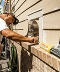Man using Big Stretch Acrylic Latex Caulking Sealant Flexible Waterproof Sealant That Will Not Crack For Home Improvement, 10.5 Fl Oz Cartridges, White, 12 Count Pack, Great For Indoor Outdoor Gaps And Weatherproof DIY Projects for outdoor gaps
