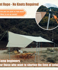 Camping Rope With Ratchet Pulley For Grab-And-Go Quick Setup tent used in an outdoor canopy setup by a river and trees